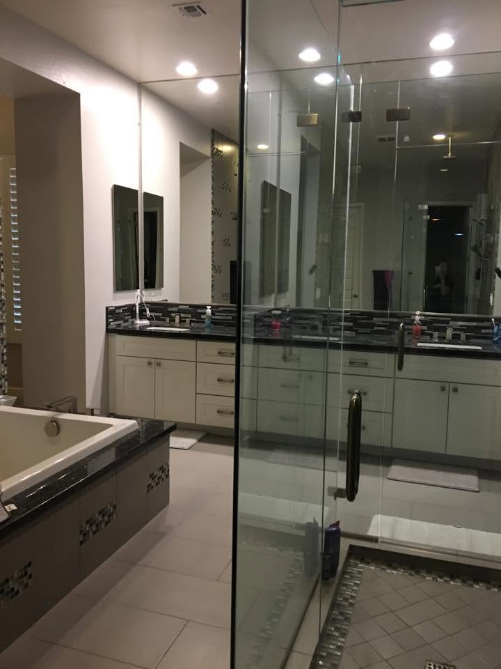 Cleaned bathroom vanity and glass shower