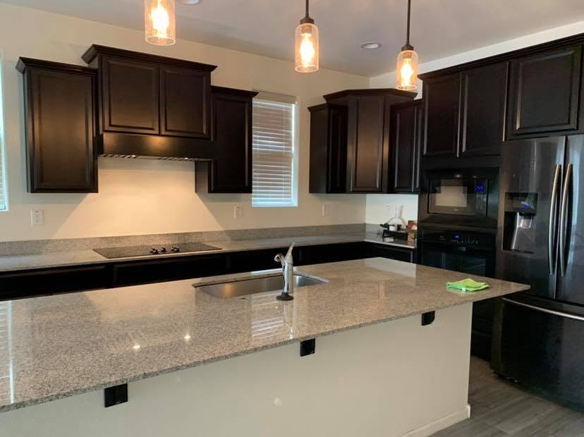 Cleaned kitchen with granite island