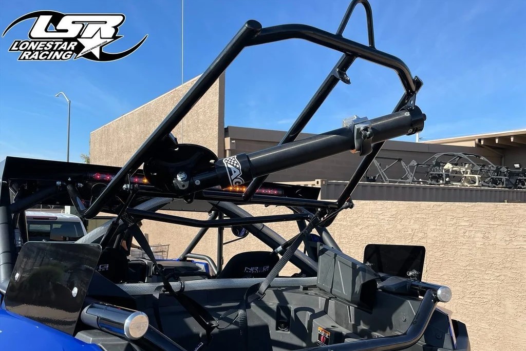 Hydraulic-assisted spare tire carrier on a Lonestar Racing race build