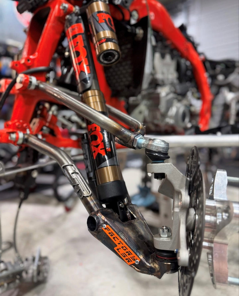 Lonestar Racing Factory A-arm with Fox shock installed on a UTV
