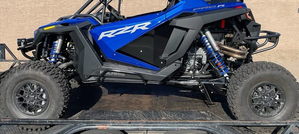 Close-up of the Polaris RZR PRO R race build's cage and suspension